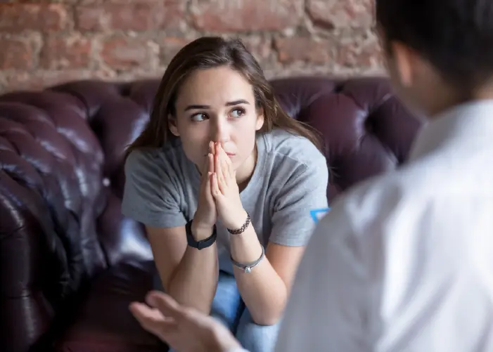 Young woman talking to a therapist – drug addiction therapy in London