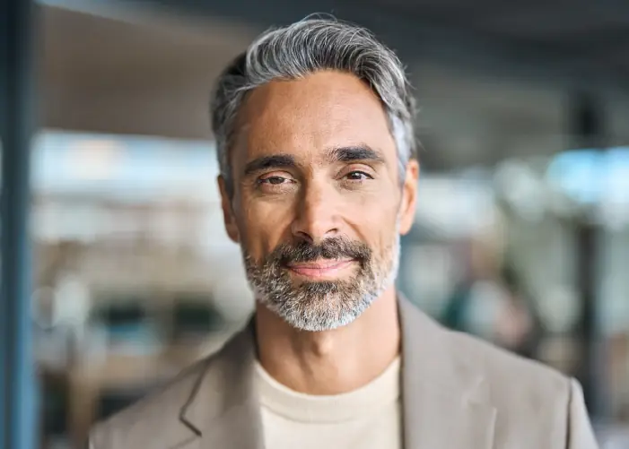 Calm, smiling man – EMDR therapy for trauma in London